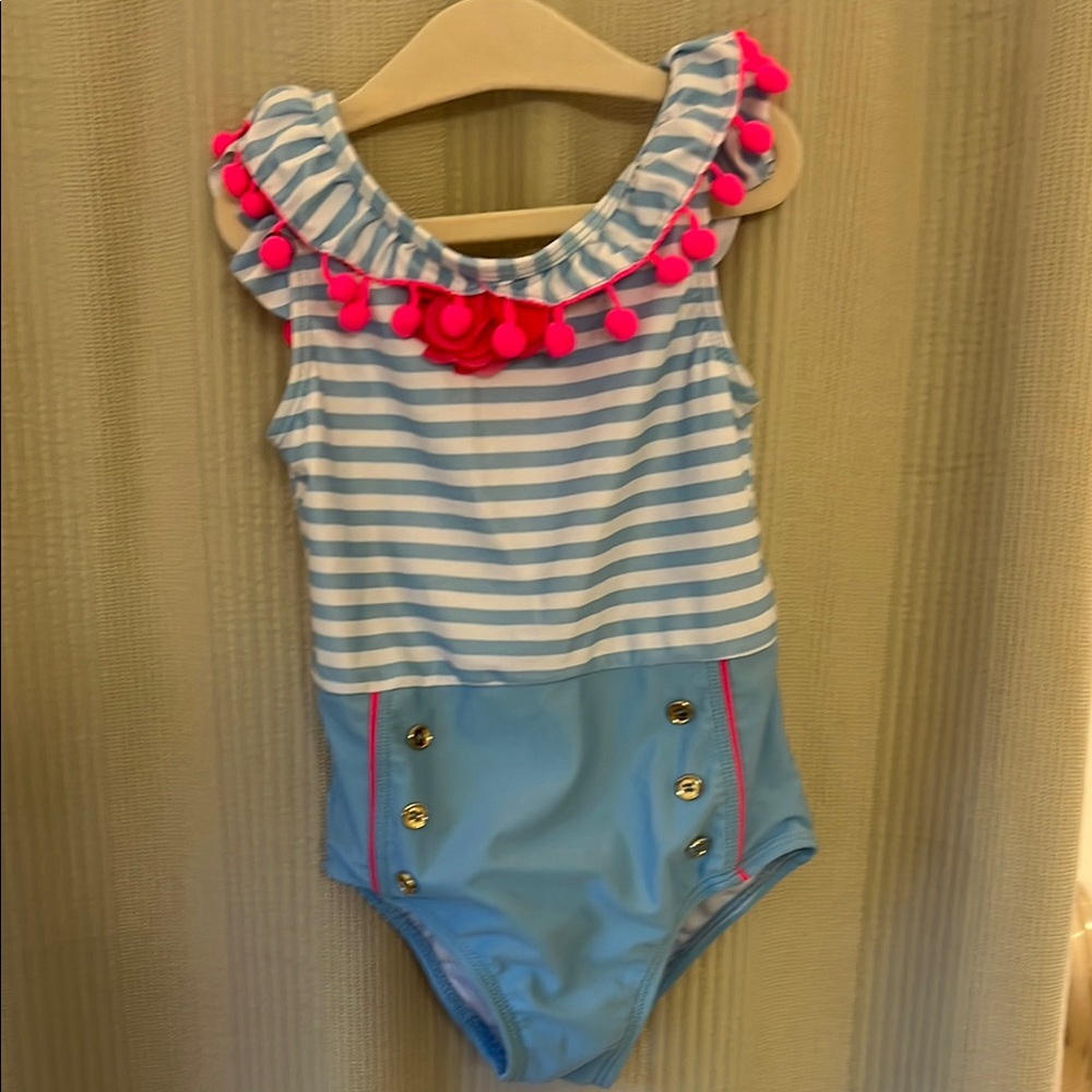 Blue and White Striped Swimsuit with Pink Accents